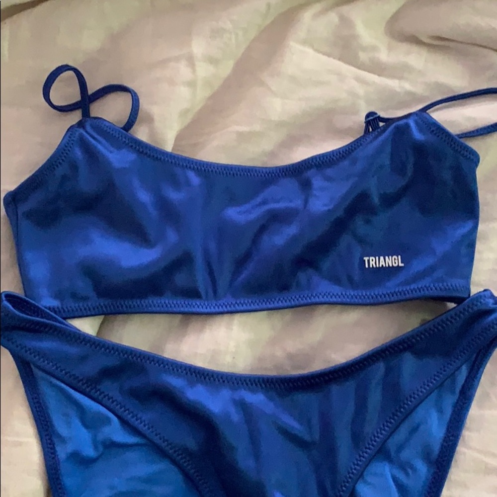 Triangl Nikon size medium. New! Never worn.